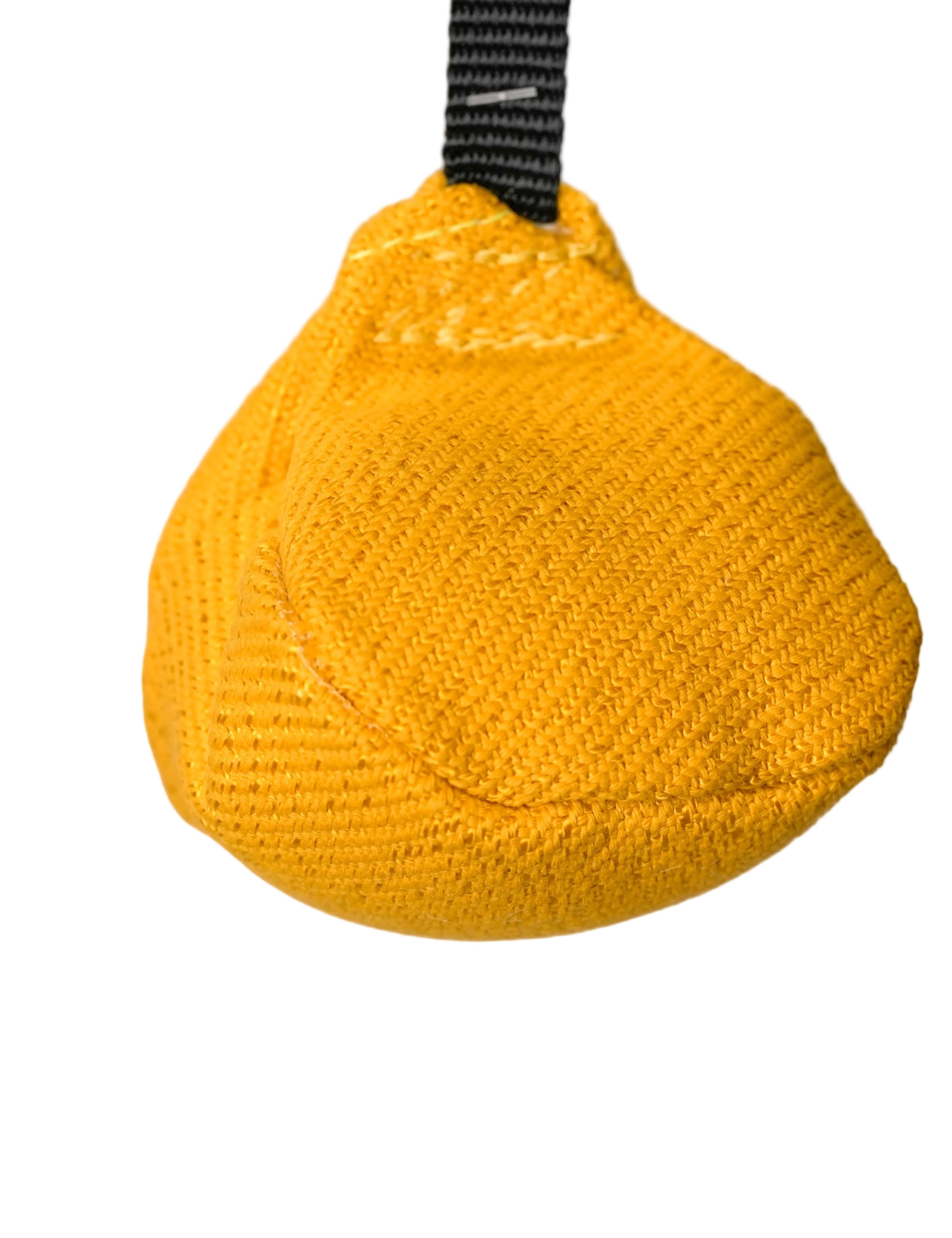 Schweikert Nylcot Ball on a String yellow closeup